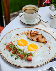 Enjoy a delicious breakfast featuring eggs, grilled chicken, and a