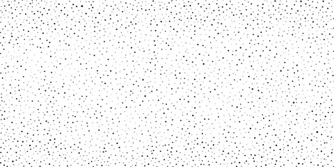 Abstract digital noise pattern with subtle grey dots creating a minimalist speckled texture. A modern granular surface ideal for versatile graphic design backgrounds and overlays.