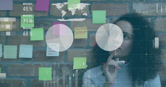 Woman studying sticky notes and shifting gaze upward, initiating business data charts for analysis