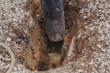 Vacuum excavator used on construction site by builders to dig ground in safe maner to expose undeground services without causing damage to them