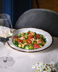 Indulge in a Gourmet Salad accompanied by a perfectly paired