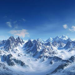Obraz premium panoramic view of snow-covered mountain peaks under a bright blue sky