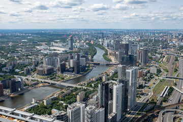 View of Moscows Skyline Showcasing Modern Architecture and River Landscape Under a Clear Sky During Daytime