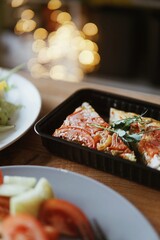 Healthy meal prep with chicken, vegetables and grains in plastic containers.
