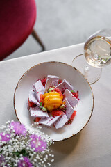An Elegant and Sophisticated Dessert Presentation With Complementary Wine and