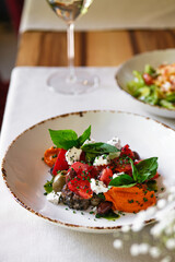 Enjoy a delightful Fresh Mediterranean Salad featuring vibrant Basil and