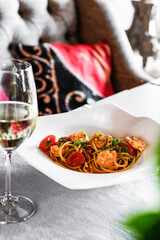 Enjoy a Delicious White Wine Pasta Dish on an Elegant