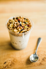 Healthy breakfast with yogurt, granola and chia seeds.