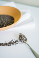 Healthy breakfast with yogurt, granola and chia seeds.