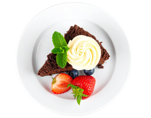 Chocolate Cake Slice with Whipped Cream and Fresh Berry Garnish, top-down view, transparent background