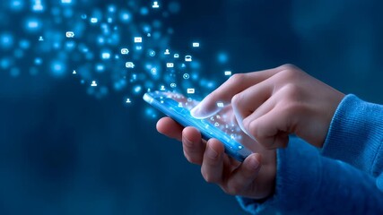 Hand touching smartphone with glowing digital icons and communication symbols emerging from screen. Blue background representing technological connectivity and data transmission. - Powered by Adobe