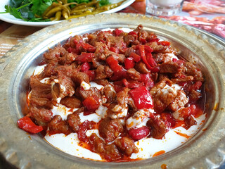Ali Nazik dish served with smoky eggplant puree and tender grilled meat, traditional Turkish cuisine.