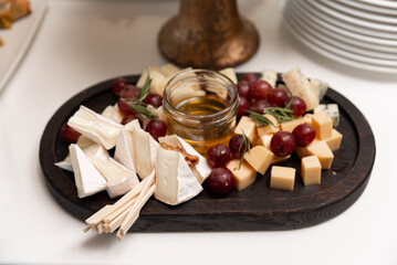 Elegant cheese and fruit platter display