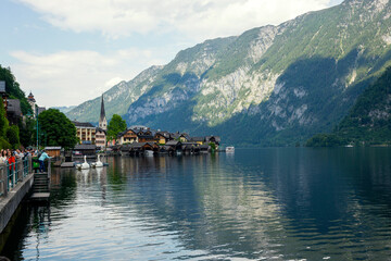 Hallstatt, Austria - June 17, 2023: View of the city of Hallstatt and Lake Hallstattersee