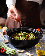 Cooking Fresh and Colorful Vegetables in a StateoftheArt Modern Kitchen