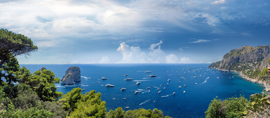 Panoramic view of an inlet full of leisure boats near Unta Tragara, along the Pizzolungo Trail, Capri, Campania, Italy