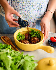 Savor the flavor of delicious meatballs served with sauce and