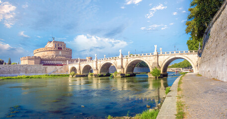 Fototapeta premium Walking alomg the shores of the Tiber river, Rome, Lazio, Italy