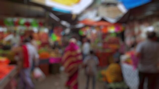 Bokeh view of Devaraja Market in Mysore, India. Blurred background footage.