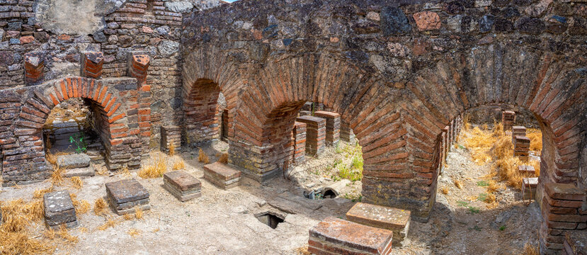 Close up of the hypocaustum (an underground structure for heating baths) among the Roman ruins of Pisões, Beja, Alentejo, Portugal - Powered by Adobe