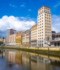 Central Bilbao skyline rfelected on the waters of the Nervion River, Bibao, Biscay, Northern Spain