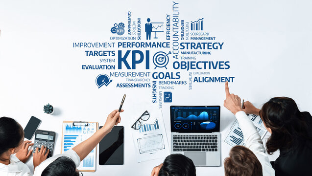 Explore the integration of business strategy and KPI analysis for enhanced performance and goal alignment. This image showcases teamwork and effective data utilization in corporate contexts. Amity