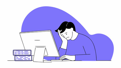 Stressed man hunched over a computer, overwhelmed by work.
