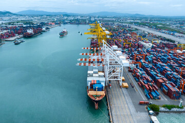 Stacks of cargo freight contners at a port shipping crates at an industrial depot or log Port Cargo Concept