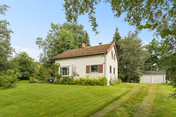 Obraz premium typical european village house, summer background