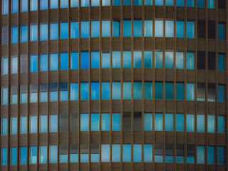 Abstract architectural texture of modern glass and metal building facade