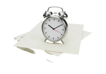 Isolated Vintage Alarm Clock on a Stack of Papers for Time Management