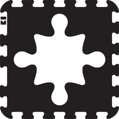 A black and white interlocking foam mat with a white puzzle piece shape in the center of the mat