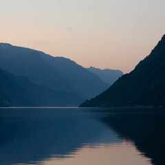 Sunset over the lake and mountains