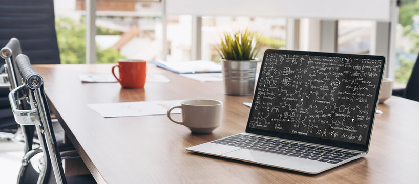 Mathematic equations and modish formula on computer screen showing concept of science and education