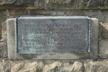 Crich Memorial Tower, England - August 13 2025: Bronze memorial plaque honoring Sherwood Foresters World War II soldiers.