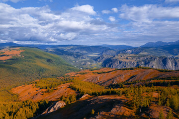 Beautiful autumn landscape with yellow trees Altai mountains Aerial photo