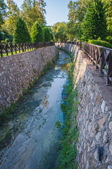 A wastewater channel with rock-lined sides. stream rehabilitation.