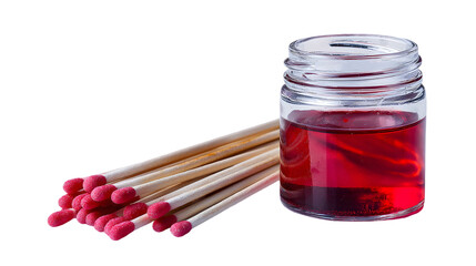 A close up shot of matches next to a small glass jar filled with a red liquid on a black background