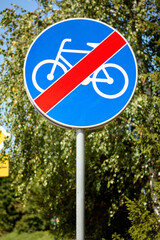 End of bicycle path road sign indicating cycling route termination