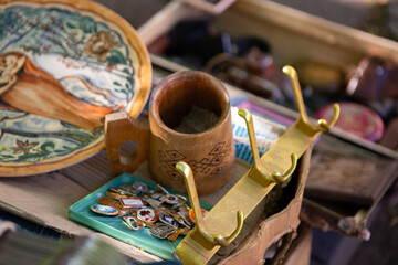 Sale of old things laid out on the asphalt