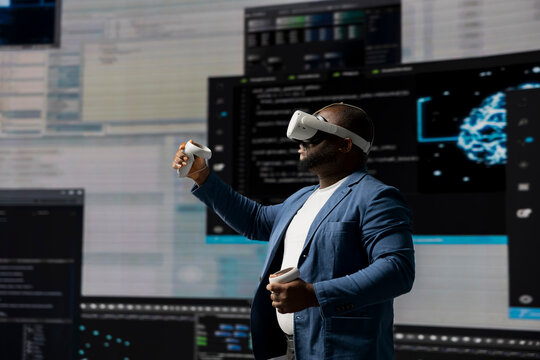 Digital tech expert coding and using VR headset at innovation hub, showcasing the intersection of data science and cybersecurity. Coding life immersed in high tech code development. - Powered by Adobe