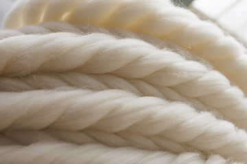 Undyed sheep wool roving close up for textile production and craft