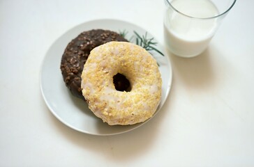 Festive donut with lemon glaze and rosemary, perfect for cozy winter menus, seasonal ads, or holiday café promotions.