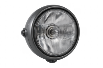 Round motorcycle headlight shining on transparent background