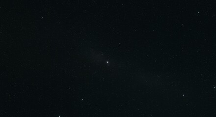 Obraz premium Dark starry night sky background with scattered bright stars and cosmic celestial atmosphere for astronomy and space themes