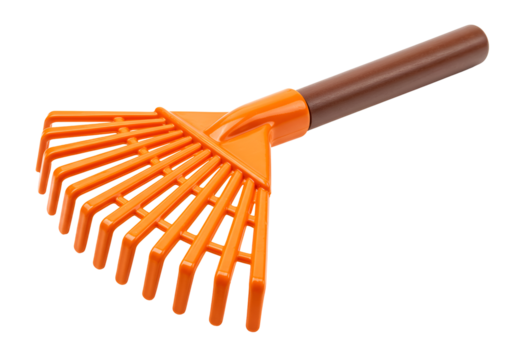Bright orange plastic rake with a long handle designed for gardening and yard work typical outdoor