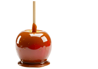 Caramel Candied Apple on a Stick with Dripping Caramel Against a Black Background