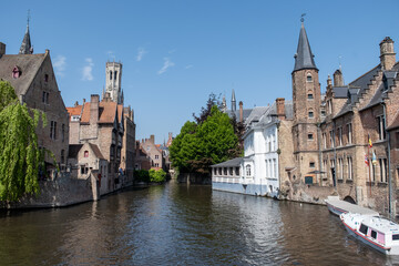 Views of canals, briges and old facades of medieval buildings in Bruges, Flanders, Belgium, travel destination