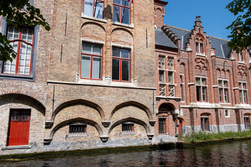 Views of canals, briges and old facades of medieval buildings in Bruges, Flanders, Belgium, travel destination