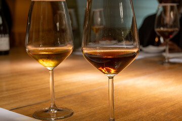Visit of wine cellar with old large oak barrels, tasting of fortified dry or sweet tasty marsala wine in Marsala, Sicily, Italy